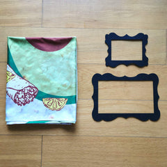 Pambo multi-use blanket shown for beach or picnic, versatile baby gear.