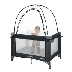 Pamo Babe Pack and Play Tent folded in its round carry bag for travel