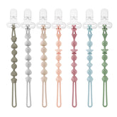 PandaEar one-piece pacifier clip keeps pacifier secure and clean during outings.