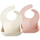PandaEar pink tawny bib on toddler catching crumbs for mess-free meals