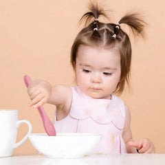 PandaEar self-feeding utensils with long, arched handles for easy grip.