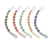 PandaEar pacifier clip with one-piece design keeps pacifiers clean and within reach.