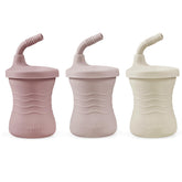 PandaEar training cup pink front view supports an easy transition from bottle to cup.