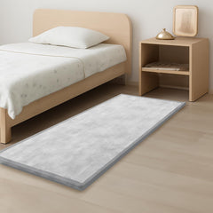 PaPaMat closeup of 1.3-inch thick plush play mat showing cushioned surface for soft landings.