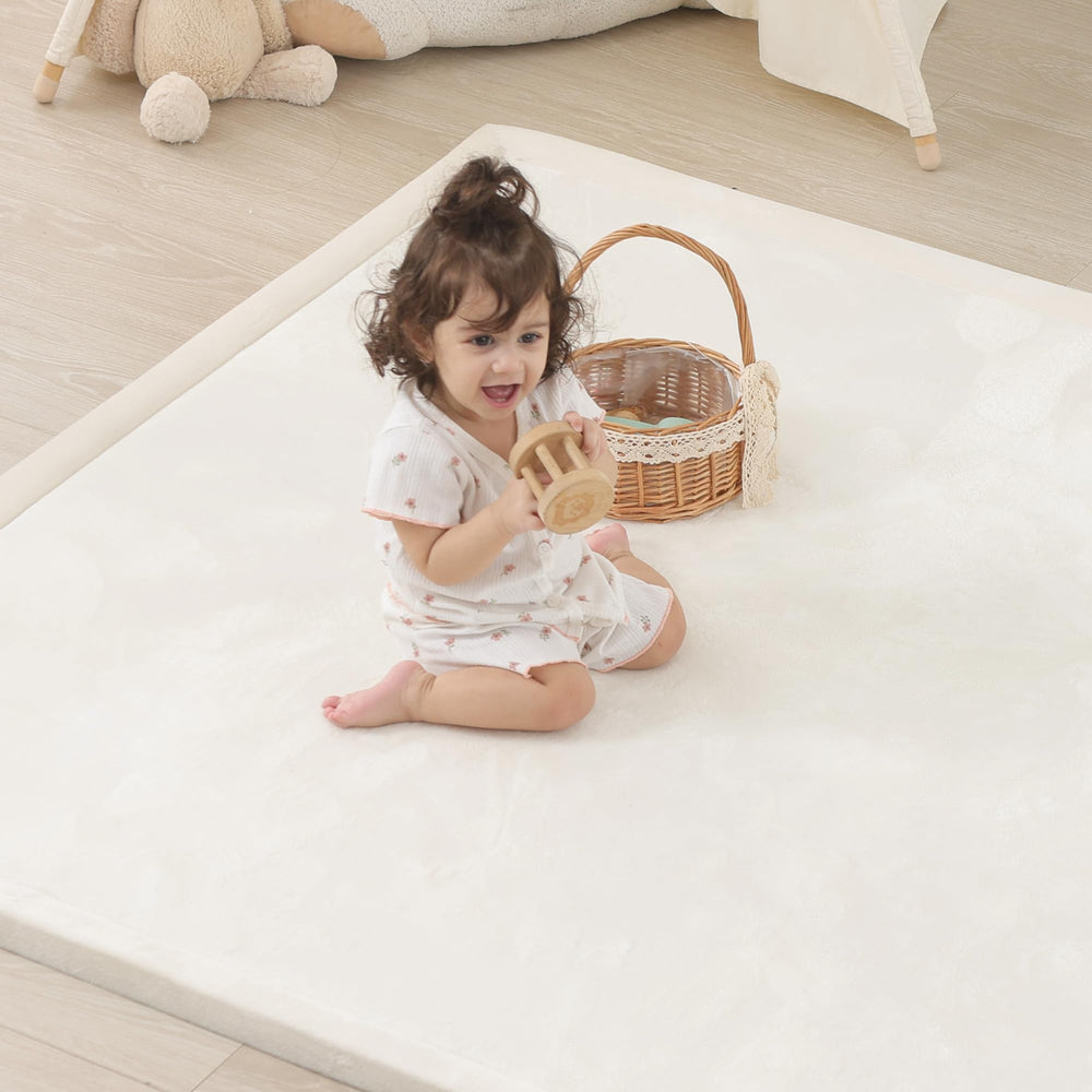 PaPaMat tummy-time-foam-mat demonstrates generous surface for tummy time play