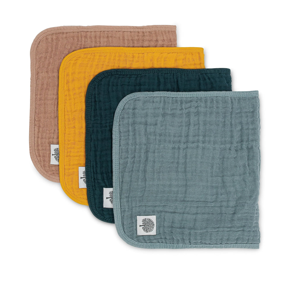 Parker Baby Co muslin burp cloths pack shows six-layer softness for gentle newborn messes.