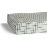 Parker Baby Co. soft-crib-sheet closeup shows 100% cotton softness for baby comfort.