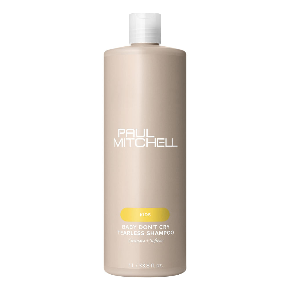 Paul Mitchell Baby Don’t Cry tearless shampoo bottle highlights gentle cleansing for sensitive eyes.