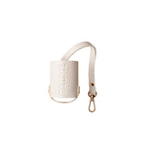 PAUME Voyager Pouch clipped to backpack for on-the-go access