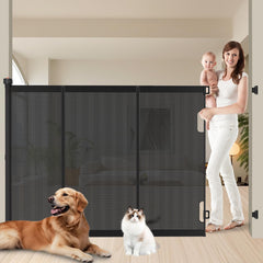 Pawtners retractable gate fully extended across a doorway for wide openings