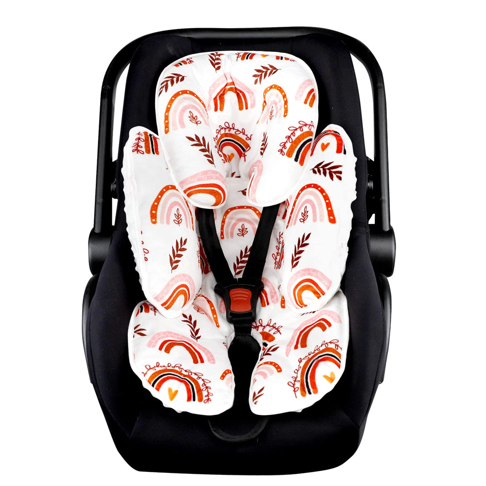 Pea Pod head support close-up with plush fabric for newborn comfort on car trips