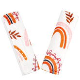 Pea Pod rainbow car seat strap cover front view adds soft comfort on rides.