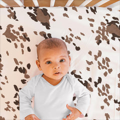 The Peanutshell bed skirt close-up adds a tidy, finished nursery decor