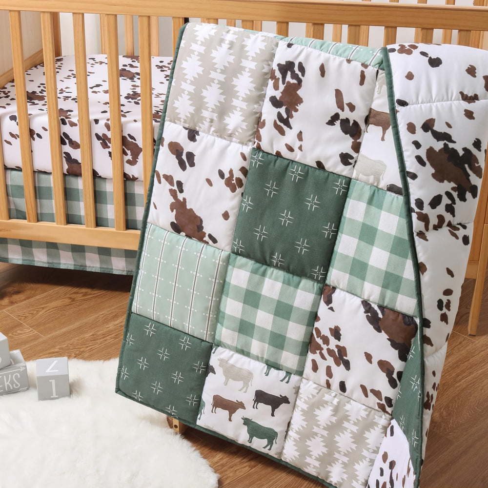 The Peanutshell quilt close-up highlights soft texture and cozy nursery feel