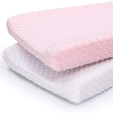 The Peanutshell changing pad cover pink white minky texture for comfortable diaper changes.