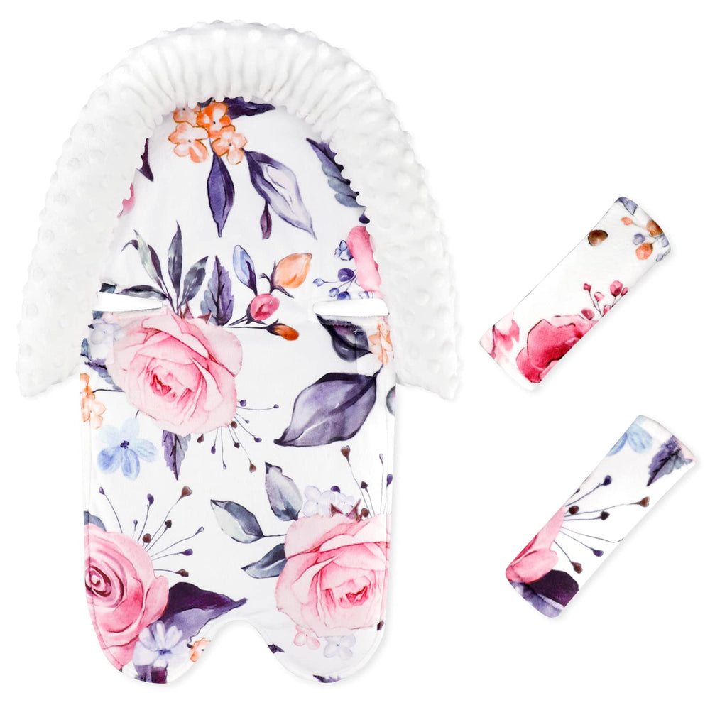 Pea Pod head support with floral Minky dot fabric provides newborn comfort in car seats.