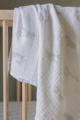 PEHR organic muslin swaddle spread to show generous 47x47 size.