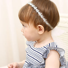 Pejlnd headband closeup lace detail showing delicate craftsmanship.