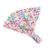 Peppercorn Kids bandana headband pink front view keeps hair neat.