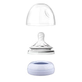 Pequeño collar ring shown with Philips Avent Natural bottle for secure feeding.