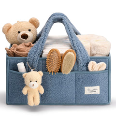 PeraBella baby diaper caddy with handle for easy grabbing during changes.