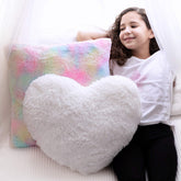 Perfectto Design white fluffy heart pillow adds cozy nursery decor and cuddle appeal.