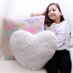 Perfectto Design white fluffy heart pillow adds cozy nursery decor and cuddle appeal.