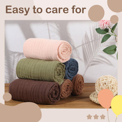 Peryiter muslin towel used as a multiuse blanket or swaddle.