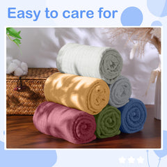 Peryiter soft-touch muslin towel with stitched edges for durable machine-washable use.