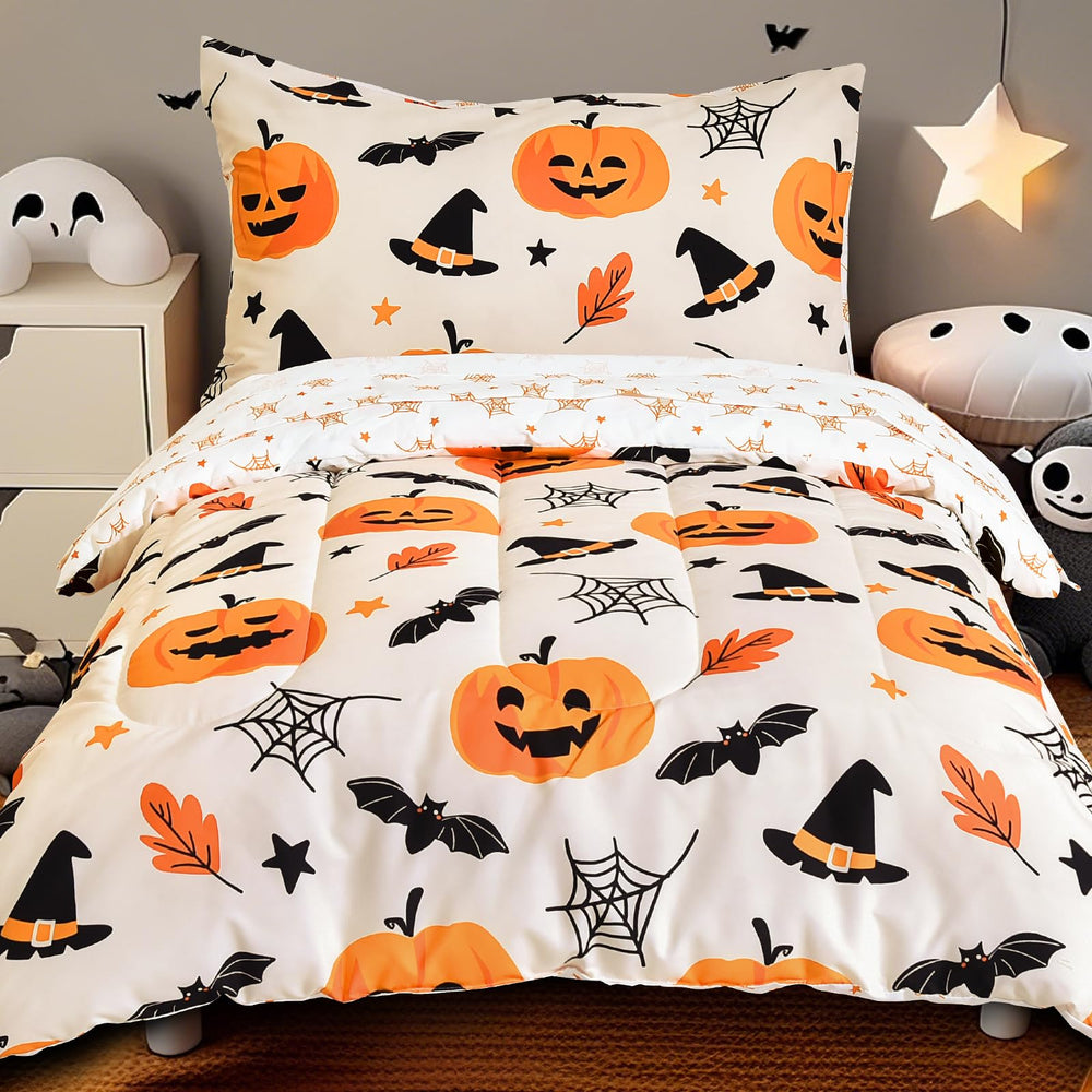 PHF pumpkin design comforter on toddler bed for cozy Halloween theme.