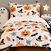 PHF pumpkin design comforter on toddler bed for cozy Halloween theme.