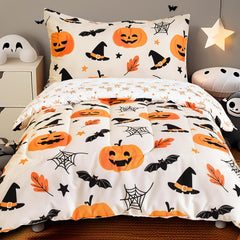 PHF pumpkin design comforter on toddler bed for cozy Halloween theme.
