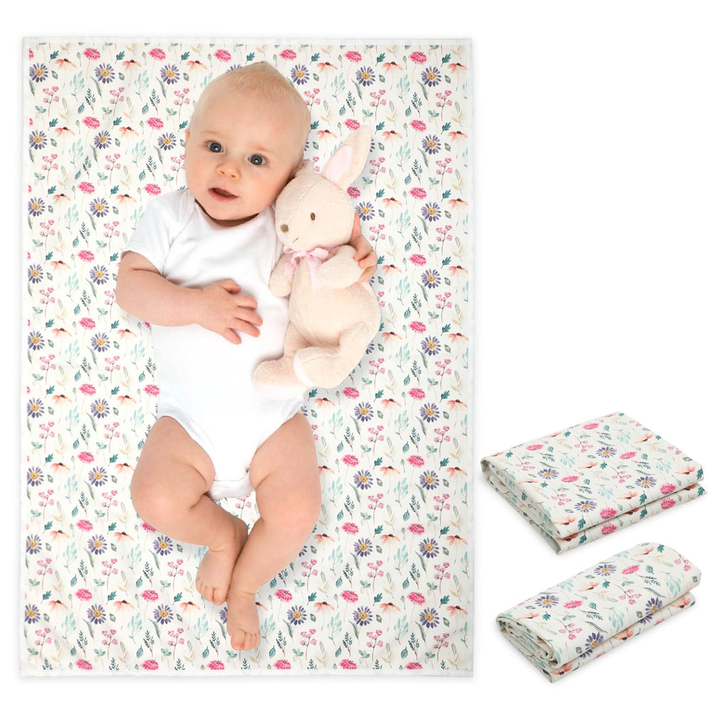 PHOEBUS BABY colorful floral changing mat folded for travel and easy packing.