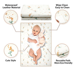 Phoebus Baby orange floral changing mat spread flat for safe diaper changes.