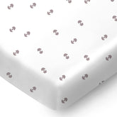 Pickle & Pumpkin mini crib sheet geometric pattern for cozy nap times.