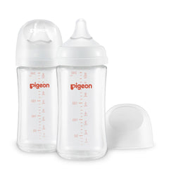 Pigeon glass nursing bottle wide neck improves grip and cleaning ease.
