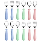Pimoys toddler utensils pink fork close-up for safe self-feeding.