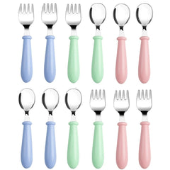 Pimoys toddler utensils pink fork close-up for safe self-feeding.