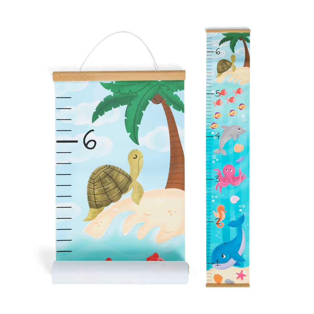 Pine & Palm growth chart wall full view with ocean scene for kids.