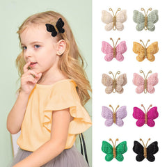 Pinkoriart butterfly hair clip close-up shows secure crocodile grip.