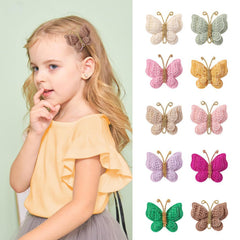 Pinkoriart two-pack butterfly clips Coffee add playful shine to outfits.