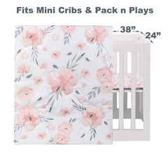 PINNKKU mini crib skirt dust-ruffle view emphasizing 10-inch drop for tidy nursery aesthetics