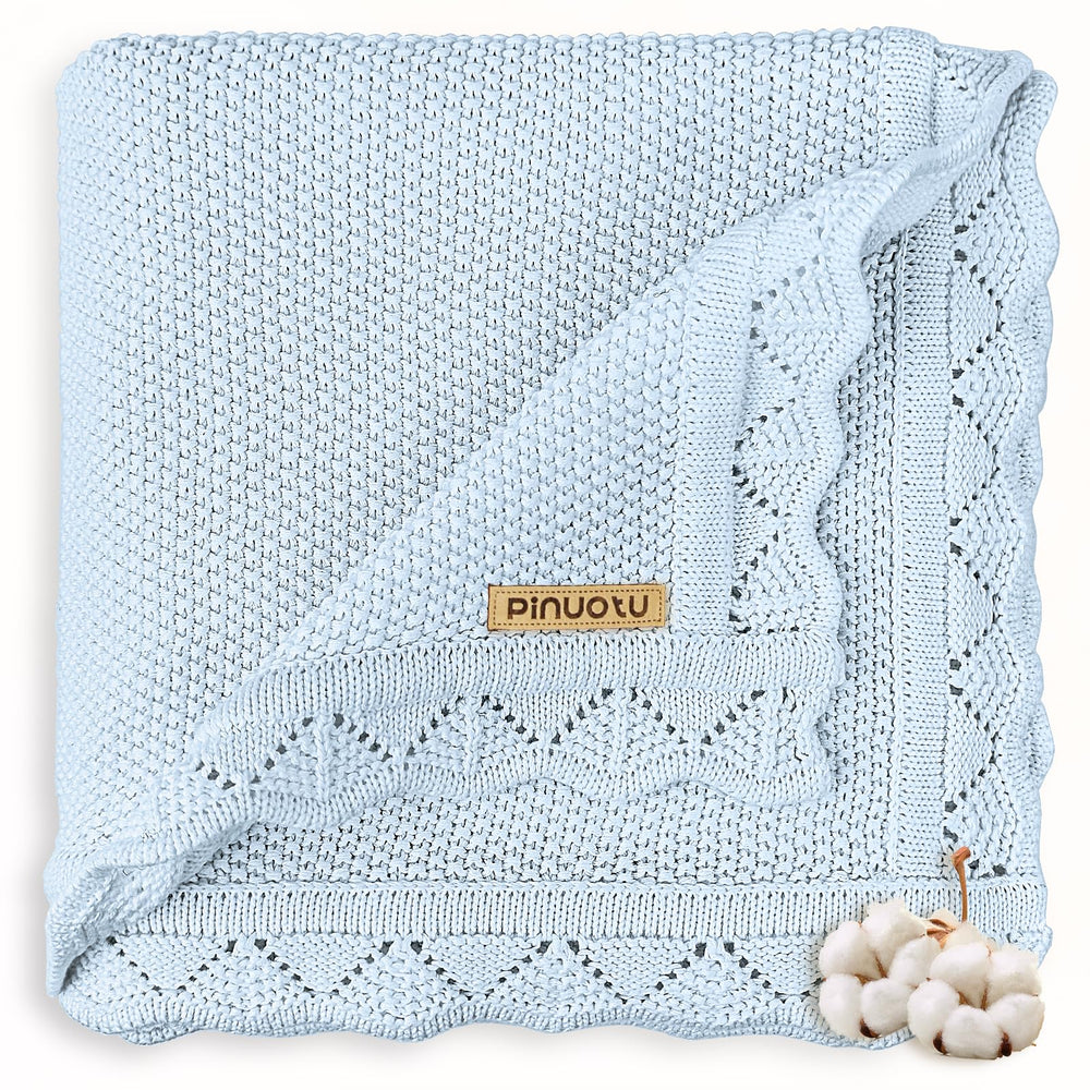 Pinuotu knitted baby blanket blue ultra-soft texture for gentle newborn comfort.