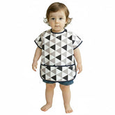Plie short sleeve bib front view highlights lightweight, wipe-clean fabric for busy mealtimes.