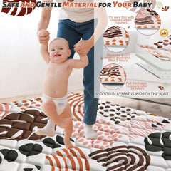 PLUUSHUU baby play mat 3D leaf prints for sensory exploration.