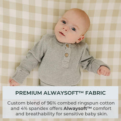 Pobibaby fabric close-up highlights ultra-soft cotton blend for gentle diaper changes.