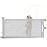 POMESEA 17h mesh short dog gate extended in doorway for scalable pet safety.