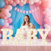 Pooqla BABY marquee letter set glows softly for baby backdrop lighting
