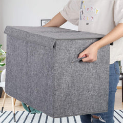 Popoly collapsible toy bin folded flat for space-saving storage.