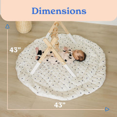 Poppyseed Play reversible play mat features two patterns for versatile nursery styling.